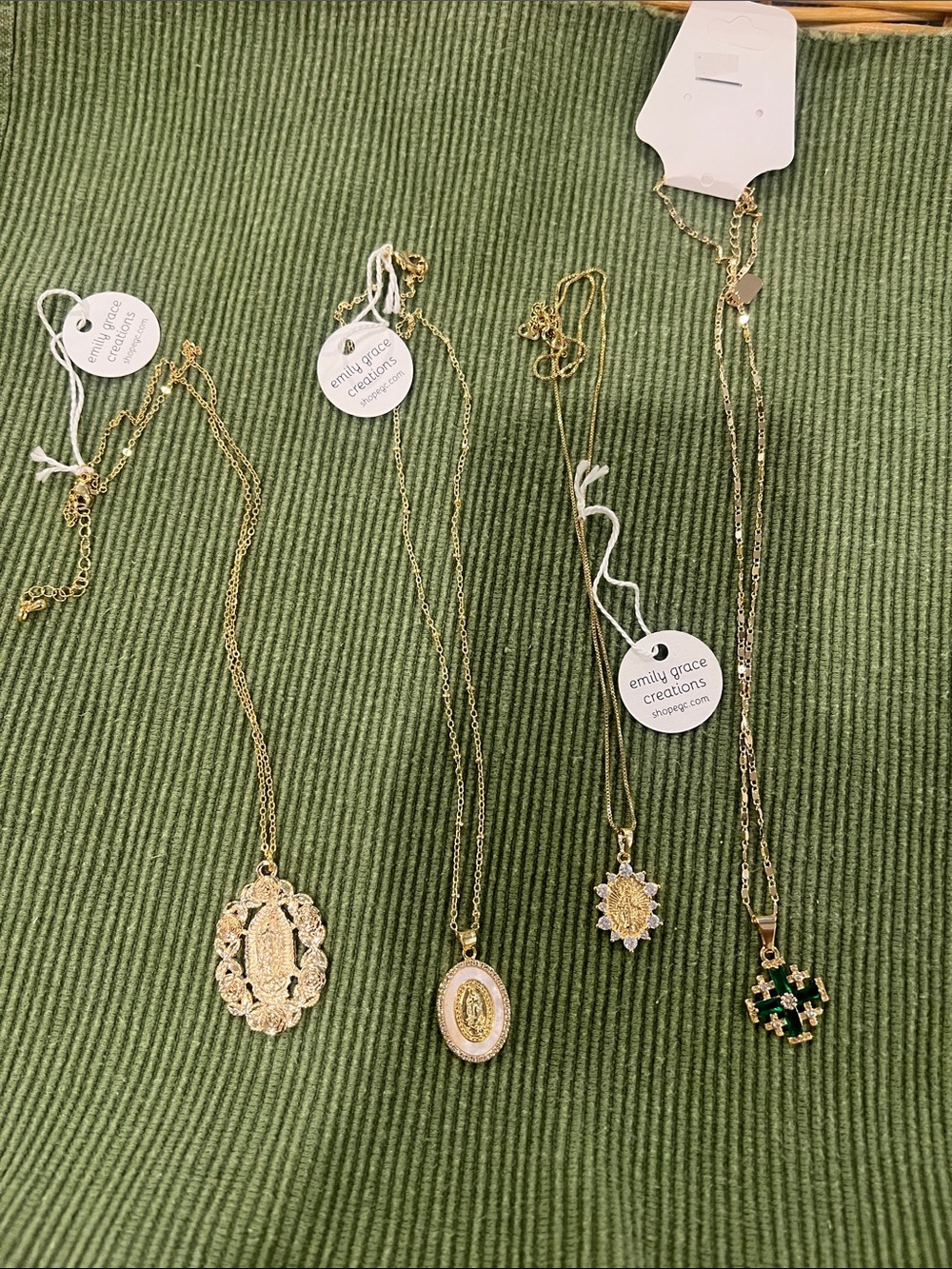 Four Gold-tone Necklaces
